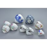 Nine Chinese Early 20th century Porcelain Bird Feeders, 4cms to 6cms high (9)