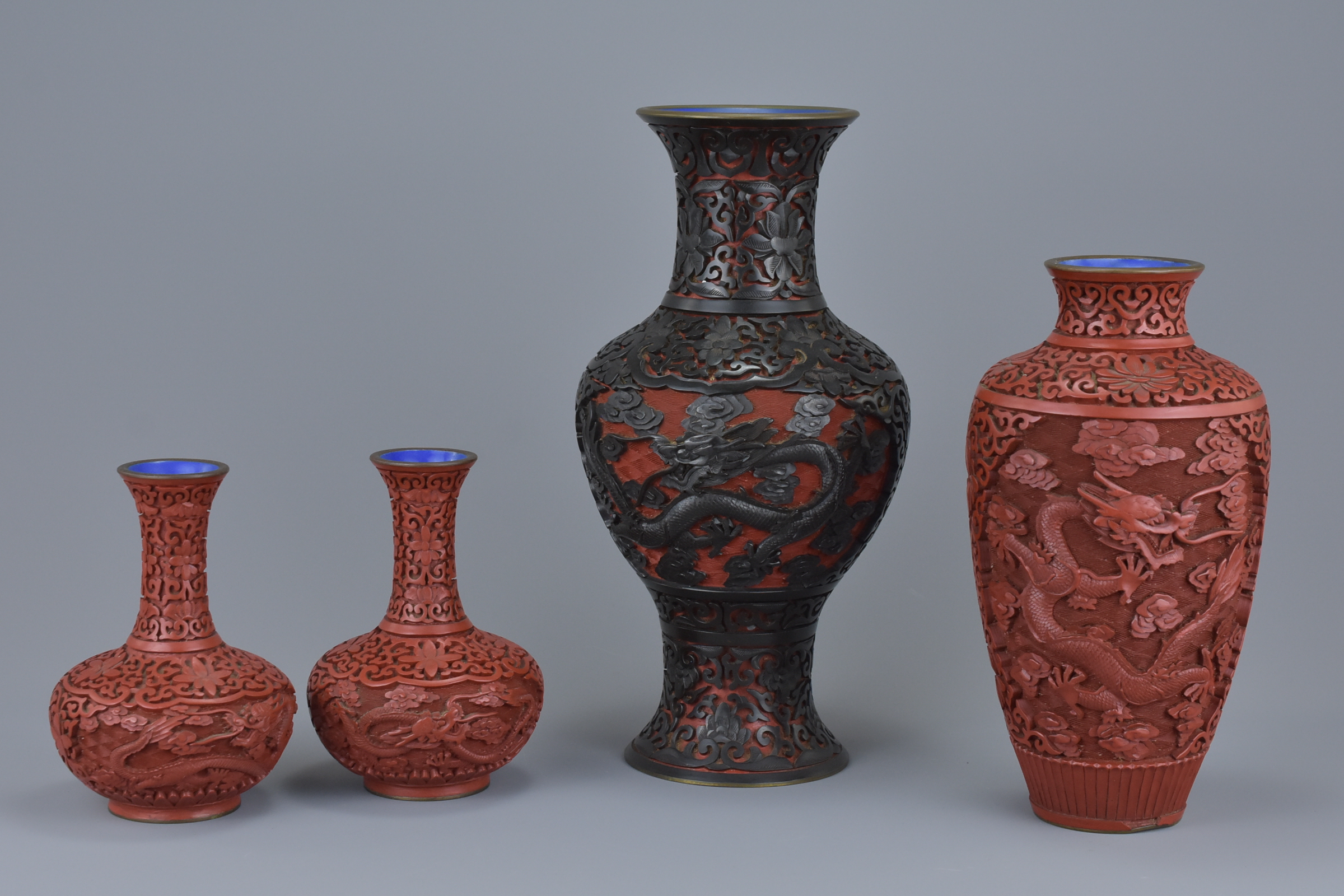 Four Early 20th century Chinese Lacquer Vases, 25cms high, 20cms high and 13cms high (4)