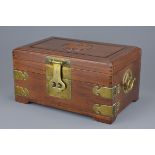 Chinese Early Rosewood Jewellery Box with Moulded Motif to Lid and Brass Mounts, 16cms high x 29cms