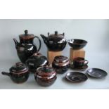A group of 11 British Studio Pottery – Winchcombe / Sidney Tustin comprising of coffee pot, tea pot,