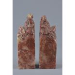 Pair of Chinese Soapstone Seals surmounted by Figures, 11cms high (2)