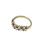A 9ct gold ring with diamond and blue stones