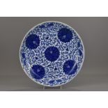 Chinese 19th century Blue and White porcelain dish decorated with chrysanthemums. 39cms diameter