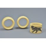 Three 19th century Ivory Napkin Rings, one with etched with a Lion (3)
