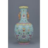 Chinese Porcelain 19th century Famille Rose Vase with turquoise glazed interior, bearing six charact