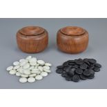 A set of Chinese Huanghuali Box and Covers together w`ith games pieces, 11cms diameter (2)