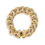 Bracelet maille ovale en or jaune 18K (750°/00) composée de deux textures d'or [...]