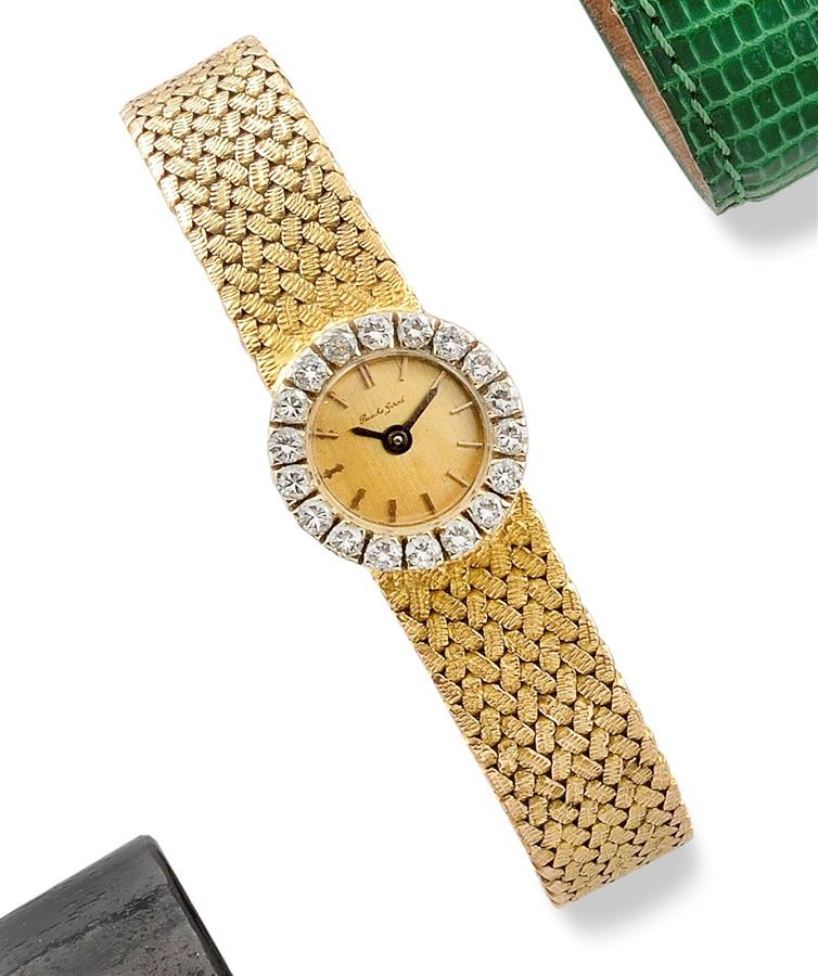 BUECHE GIROD. Montre de dame en or jaune 18K (750°/00). - Fin des années 50. [...]