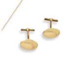 Paire de boutons de manchette en or 18K (750°/00), décor de bulles. Poids : 11,7 g -