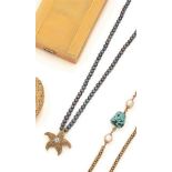 Collier de perles d'eau douce grises orné d'une étoile de mer en or jaune 18K [...]