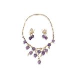 Demi parure en or jaune 18K (750°/00) et améthystes comprenant un collier et une [...]