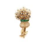 Broche bouquet de chardons en or jaune 18K (750°/00) et platine (950°/00) sertie de [...]