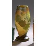 LEGRAS. Vase en verre multicouches orange et vert à décor gravé à l'acide de [...]