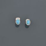 Boucles d'oreilles en or gris, 750 MM, ornée chacune d'une turquoise entourée de [...]