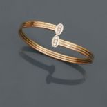 FRED, Bracelet deux ors, 750 MM, orné de six diamants, signé, poids : 9,5gr. brut. -