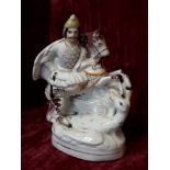 A Staffordshire flatback style figurine of George and the Dragon.
