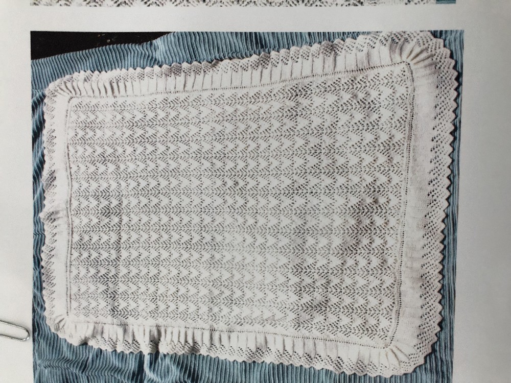 A beautiful hand knitted christening blanket.