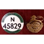 A Public Service Vehicle PSV Conductor's badge with an early British Road Services cap badge.