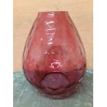 A large hand blown Cranberry glass shade for an oil lamp.