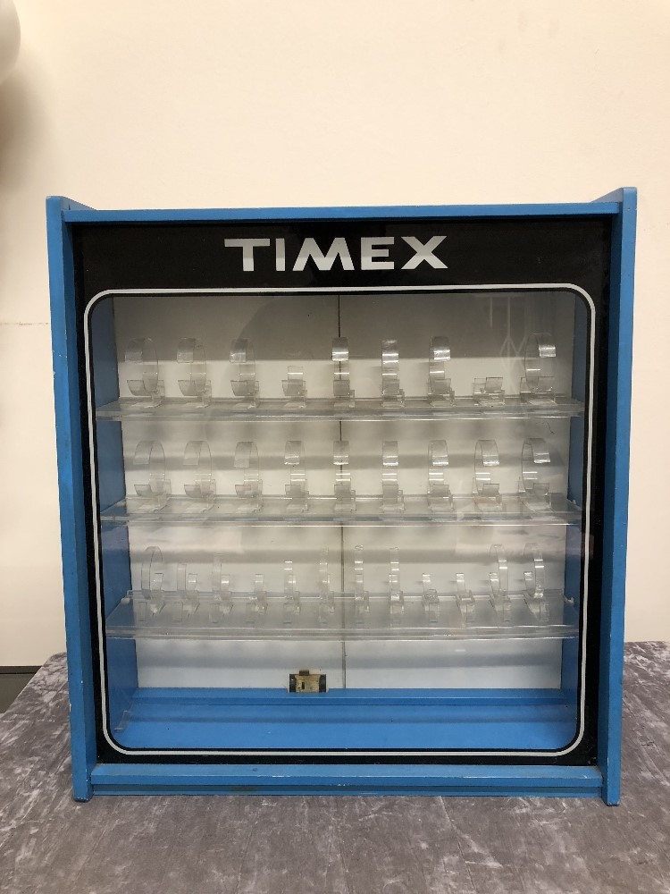 A Timex watch shop display cabinet.