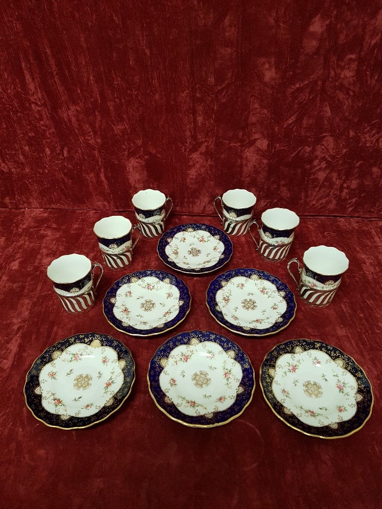 A set of six Coalport and silver cups with saucers decorated in a beautiful blue floral pattern.