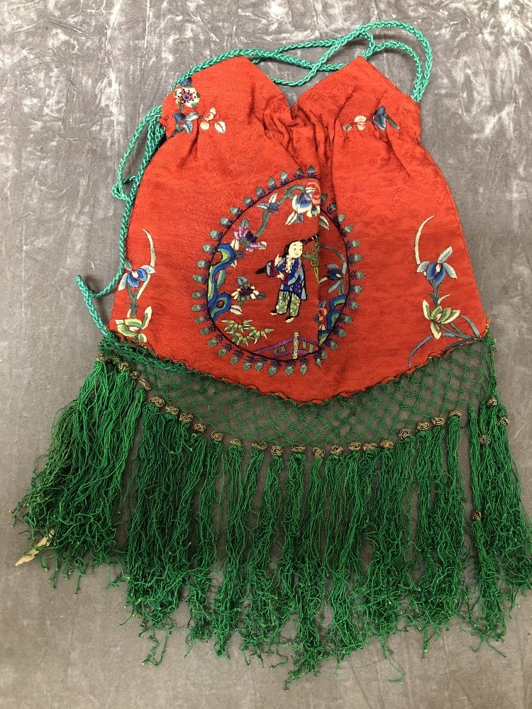 A lovely antique (19th/early 20th Century) Chinese purse in red silk.