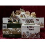 A collection of eight boxed Lilliput Lane cottages.