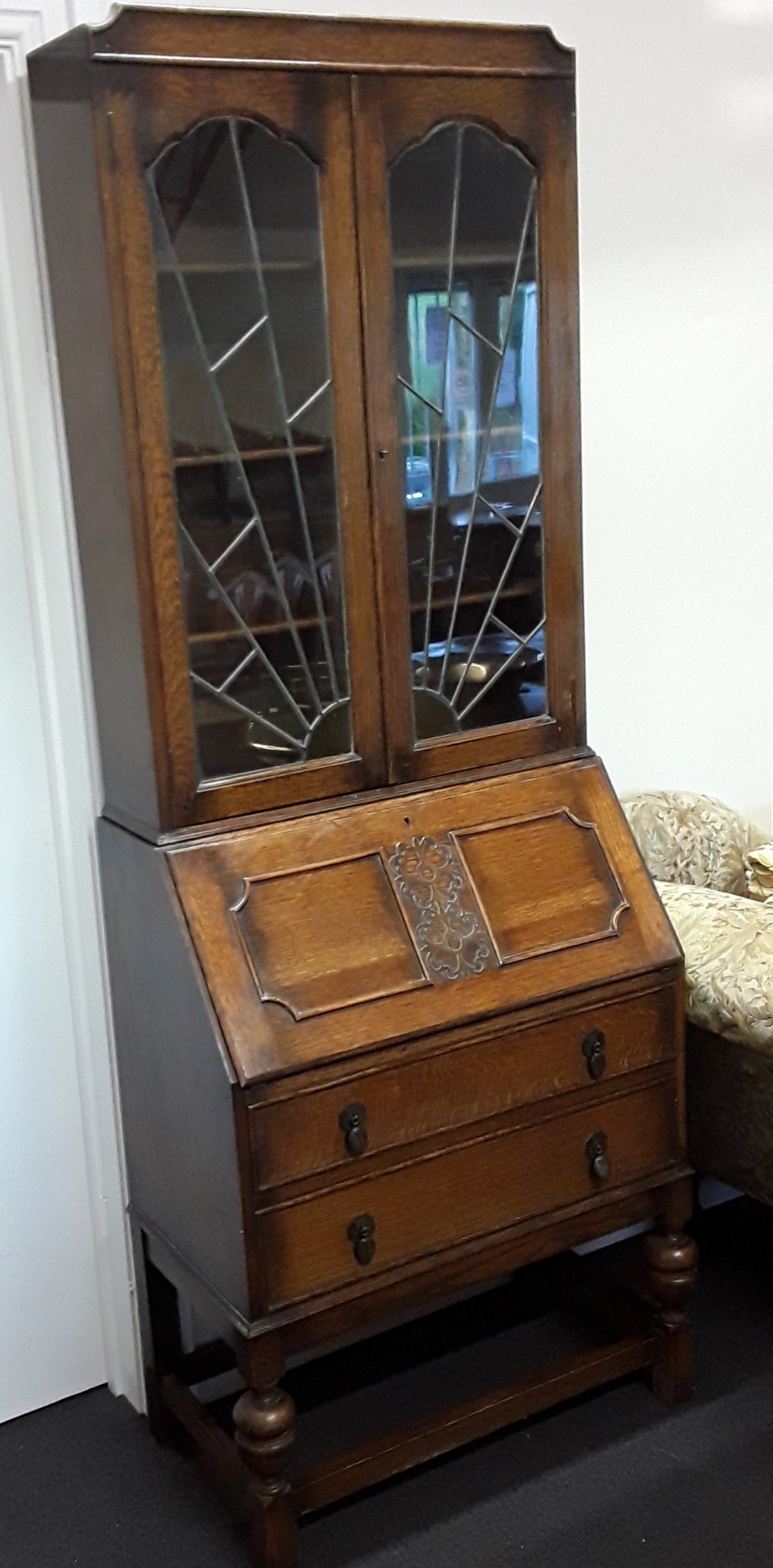 An Art Deco oak bureau bookcase.