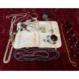 A selection of costume jewellery including silver.