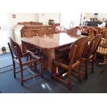A stunning Art Deco burr walnut extendable dining table and matching sideboard drinks cabinet.