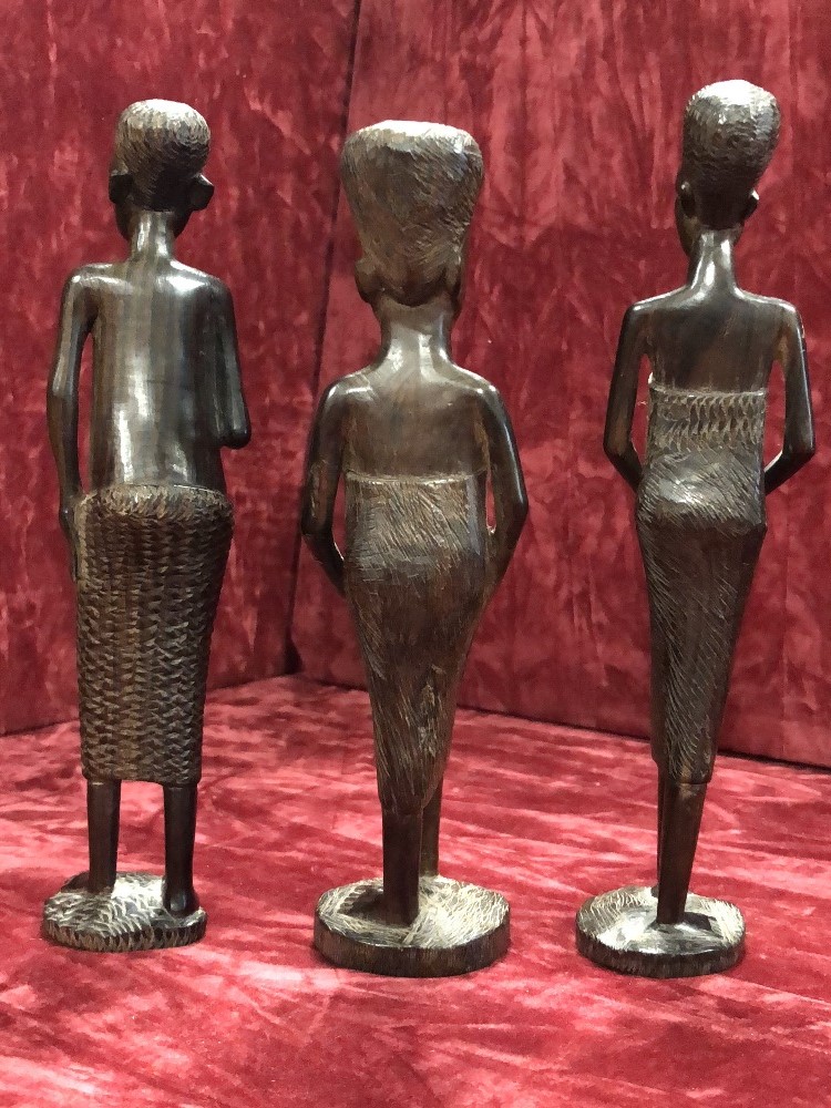 A group of three African carved wooden tribal figures - Image 3 of 7