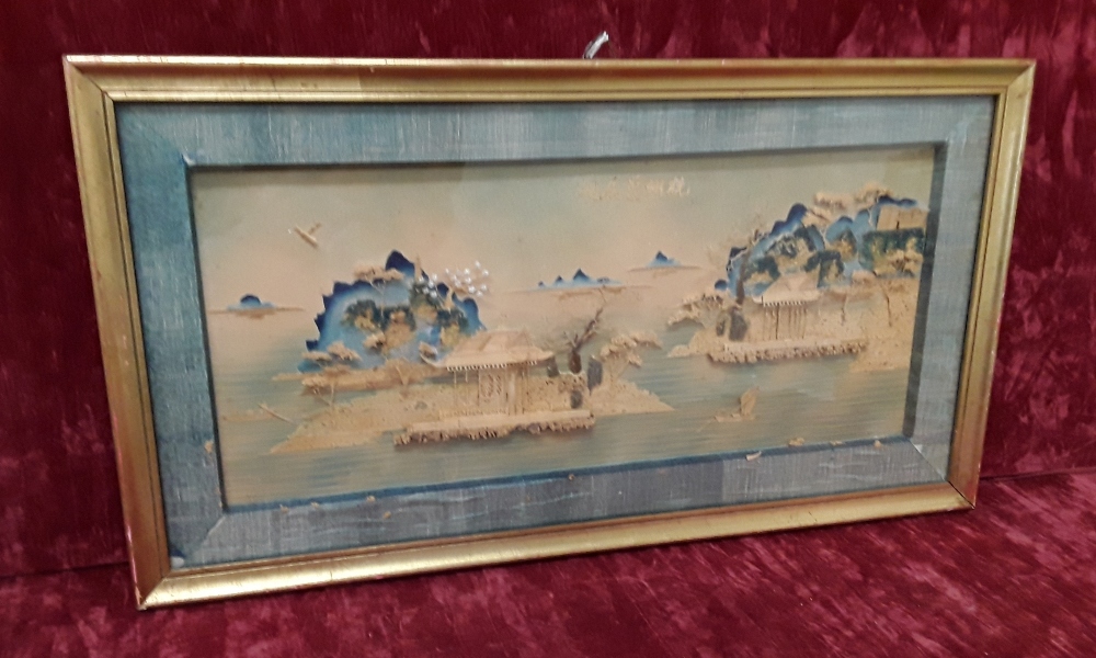 A framed and glazed Oriental carved cork and wood diorama.