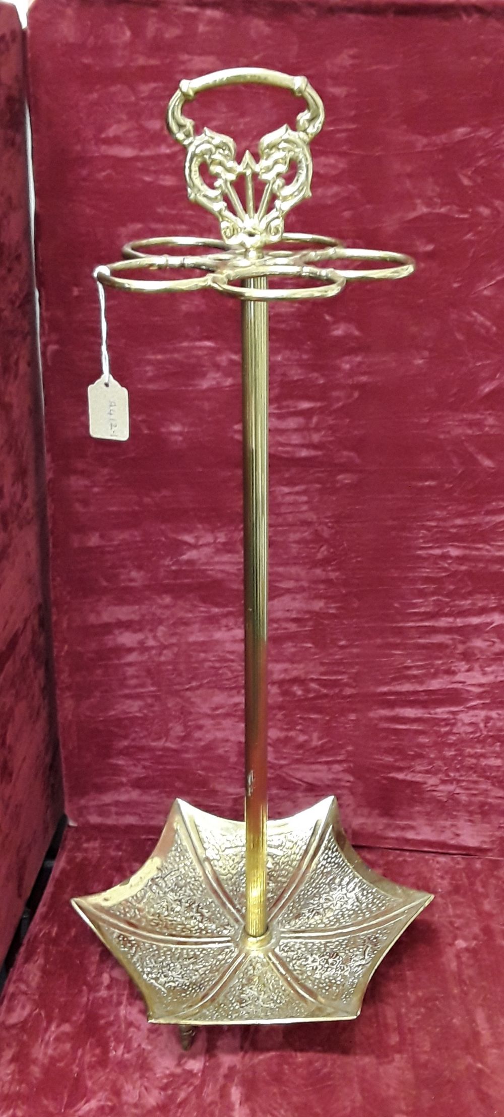 An unusual brass umbrella stand.