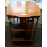 A 1920's mahogany two tier revolving book case