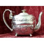 An early 19th Century silver cuboid shaped teapot.