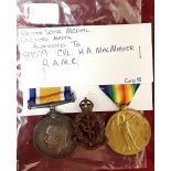 A WW1 Royal Army Medical Corps medal pair together with his cap badge.