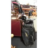 A lady's complete golf set with TEXAN clubs and Powerkaddy bag.