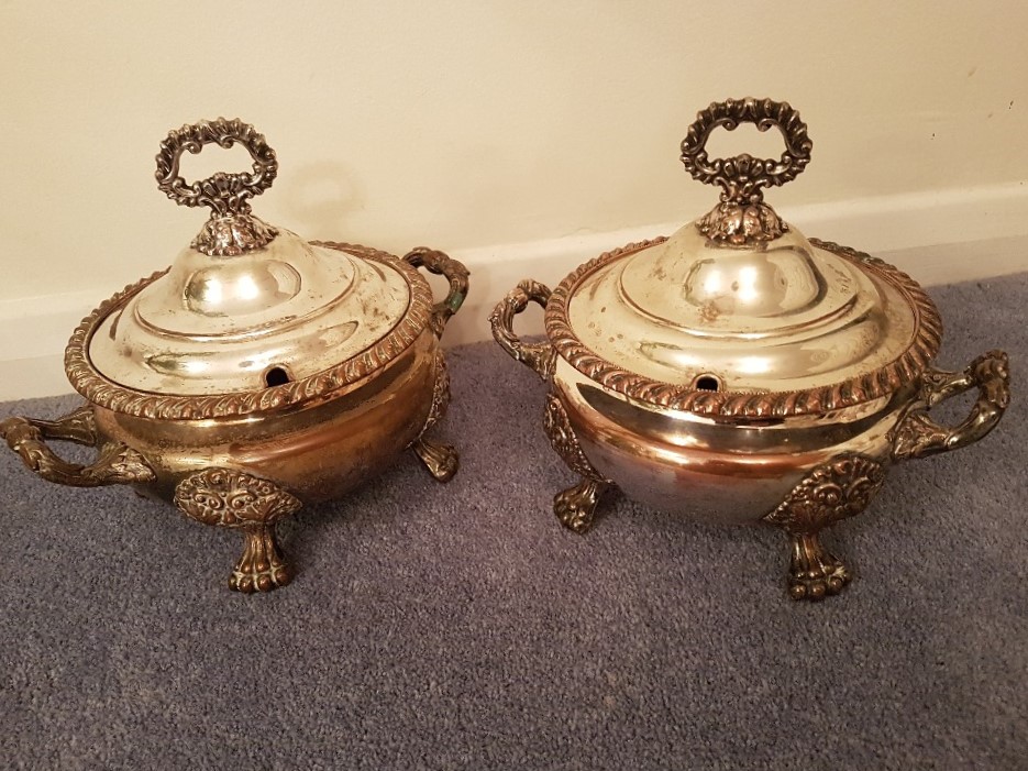 A pair of silver plated lidded soup tureens with “Palm of Hand” trademark to base.