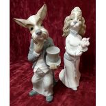 A pair of Nao figurines showing dogs as bride and groom.