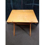 A vintage pine folding school desk.