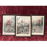Three wood framed hunting themed prints.