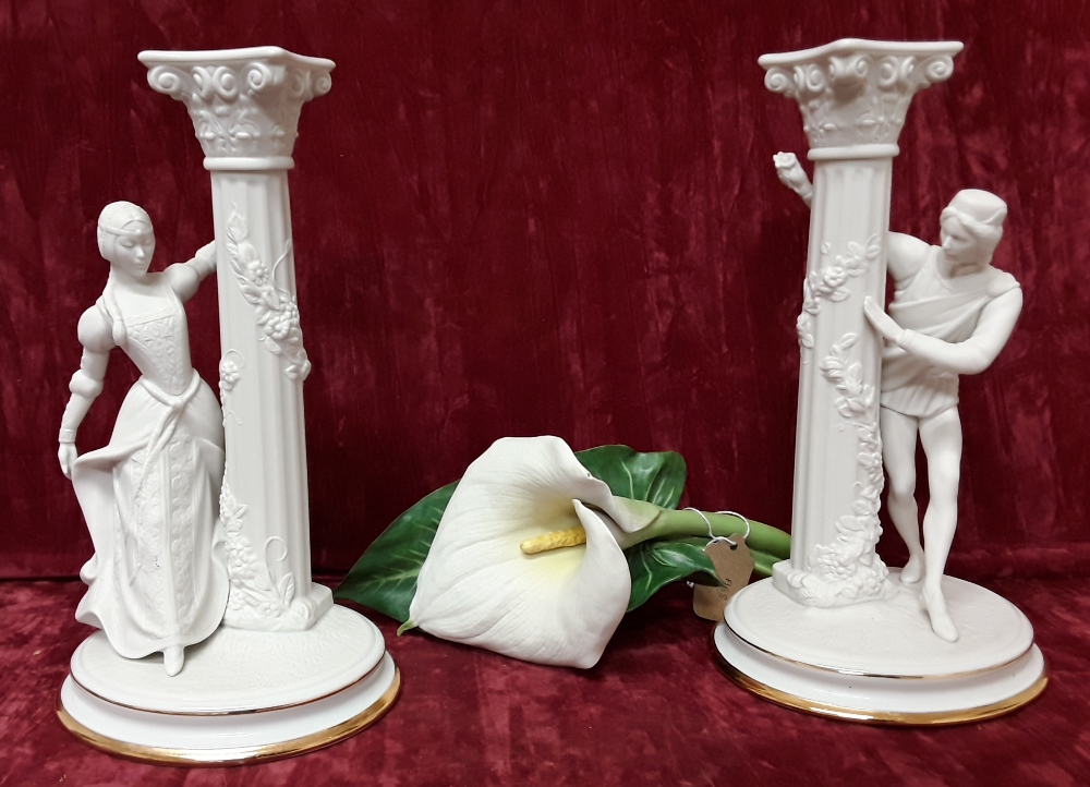 A pair of Franklin Mint fine porcelain Romeo and Juliet candlesticks and porcelain galla lily.