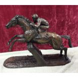 A stunning cold cast bronze/resin sculpture by Harriet Glen of champion hurdler Istabraq.