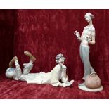 A pair of large Lladro clown figurines. Signed to base. Number 4618 and 6997.