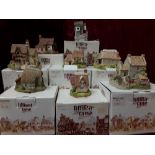 A collection of eight boxed Lilliput Lane cottages.