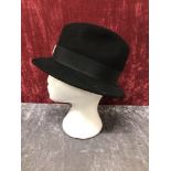 A black soft crush hat with black ribbon trim.
