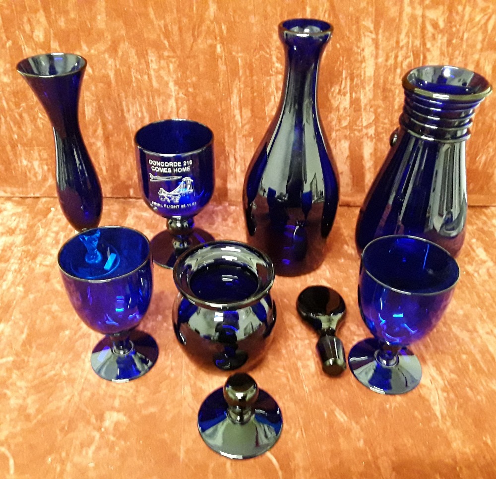 A collection of blue glass including Bristol Blue.