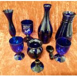 A collection of blue glass including Bristol Blue.