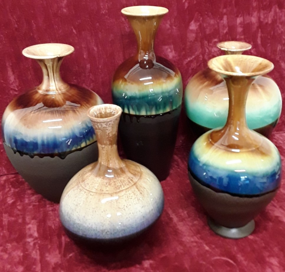 Five beautiful salt glazed ceramic vases made in Iran.