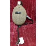 A WW2 German Third Reich Wehrmacht water bottle with carry strap etc.